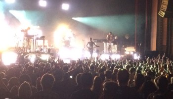 a wide shot of a crowd concert