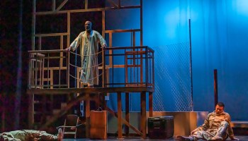 Othello (L. Peter Callender) hears of the death of Roderigo (Gabriel Ross) and wounding of Michael Cassio (Ariel Sandino) during a 2019 AASC performance.