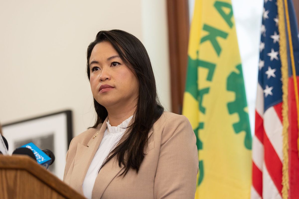 Oakland Mayor Sheng Thao stands at a podium.