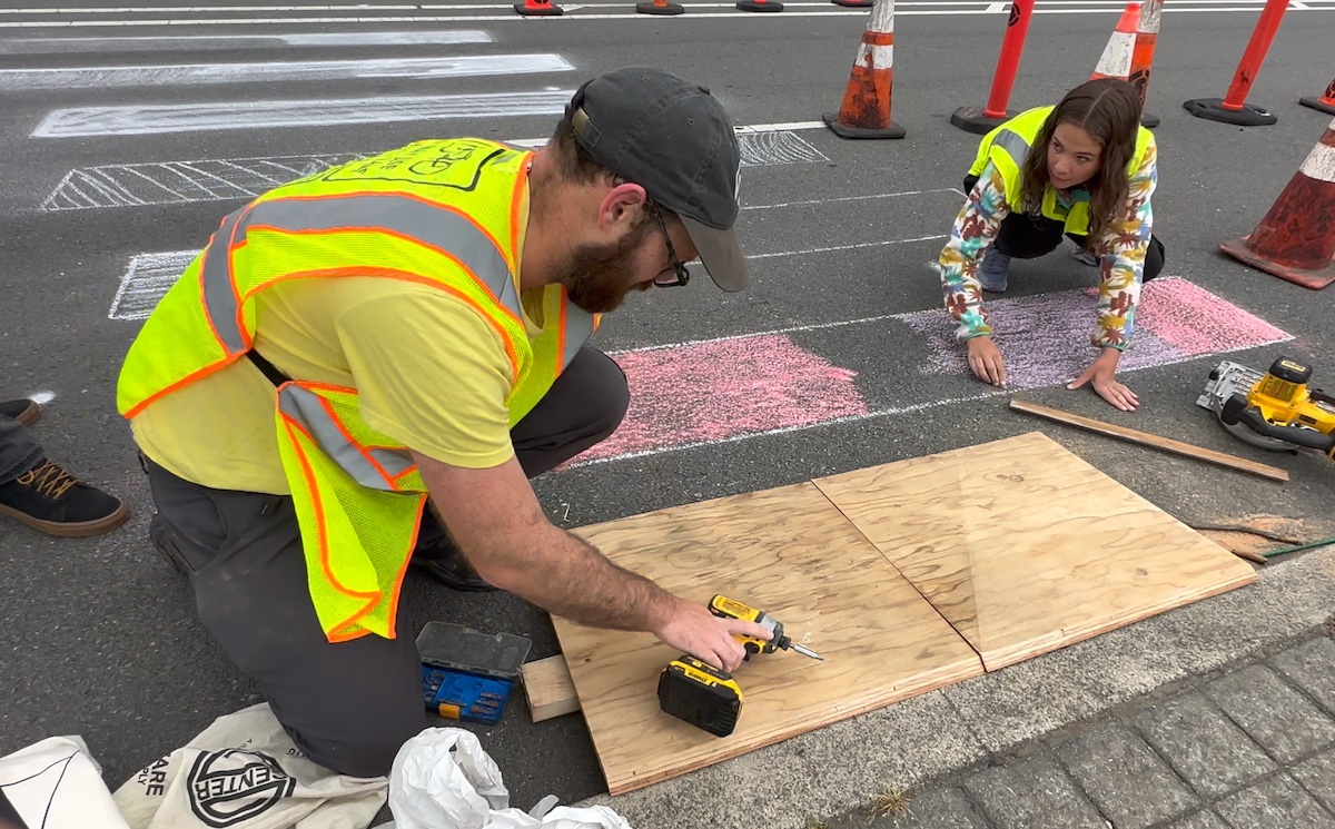 A young high schooler and an traffic safety advocate work together to build a safe crosswalk on Broadway in Oakland